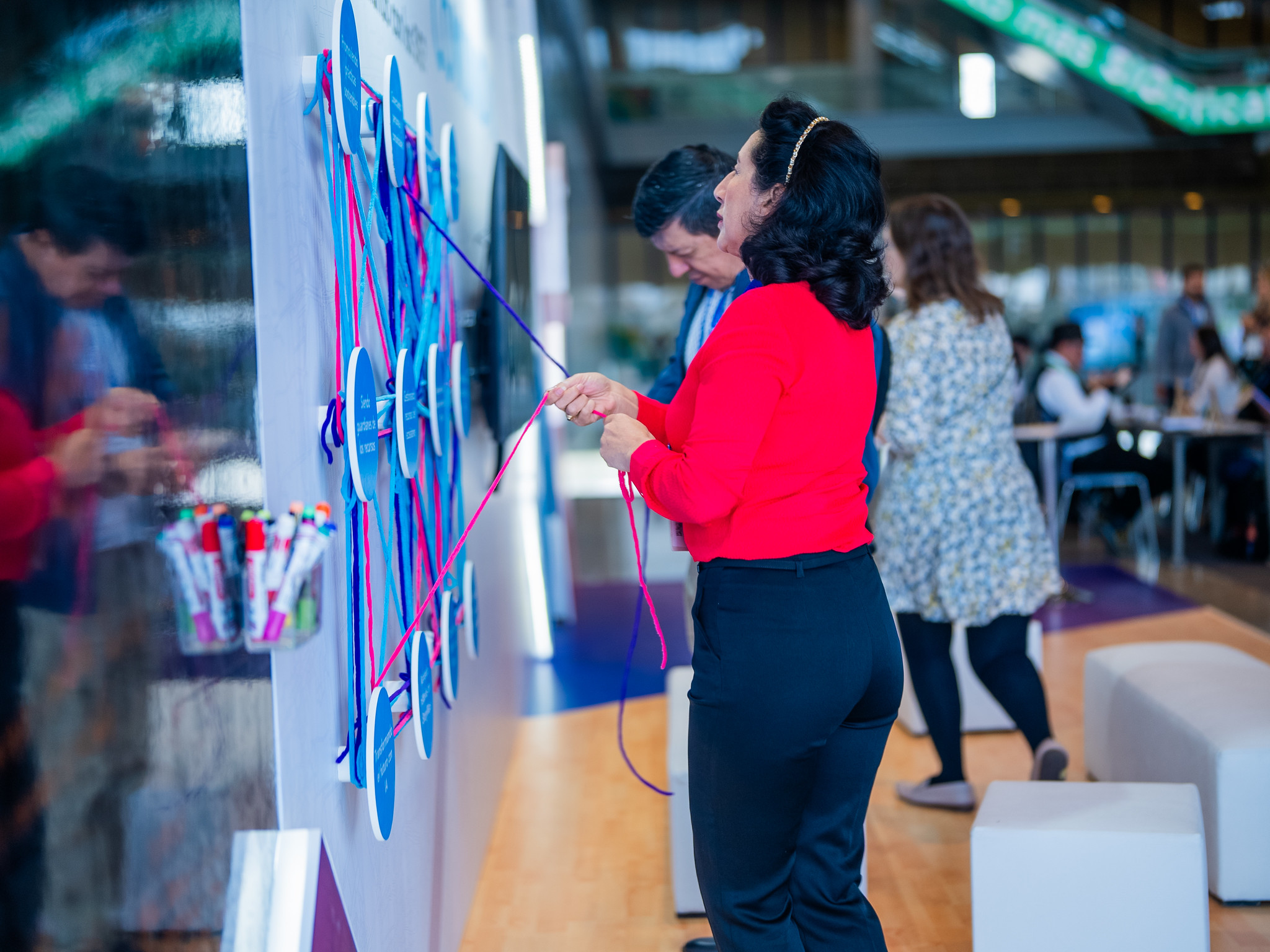 Experiencia hilos stand de comunidad CUE 2024